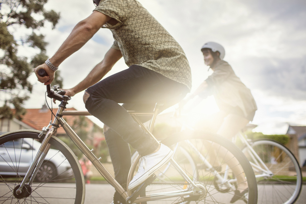 Australian Mid Adult Couple Riding Bikes Back Home 505471082 7000X4667